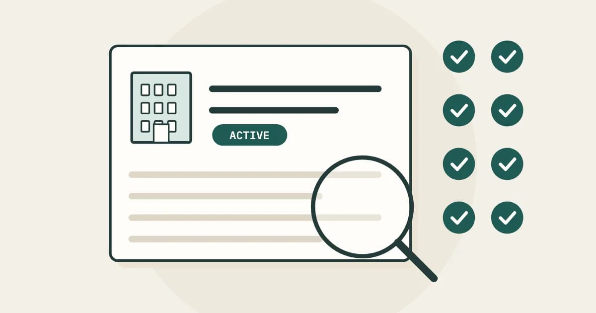 A company's register record marked active, under a magnifying glass, with eight ticks