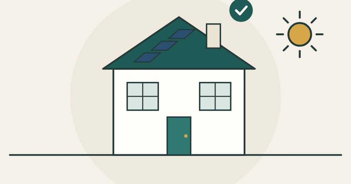 A house with solar panels on the roof and the sun beside it