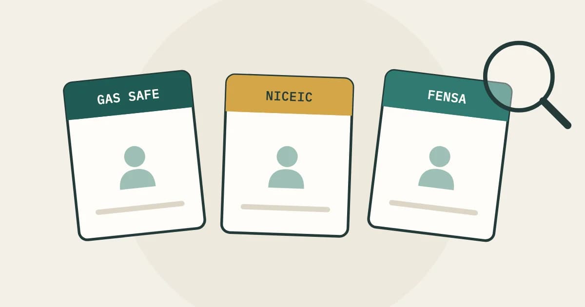 Three accreditation cards, Gas Safe, NICEIC and FENSA, under a magnifying glass
